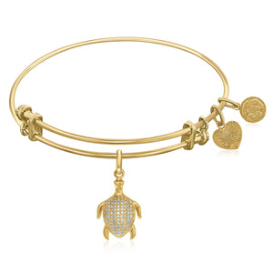 Expandable Yellow Tone Brass Bangle with Turtle Symbol and Cubic Zirconia