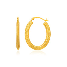 Load image into Gallery viewer, 10k Yellow Gold Oval Line Texture Hoop Earrings
