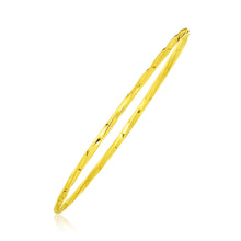 Load image into Gallery viewer, 14k Yellow Gold Thin Twisted Shiny Bangle

