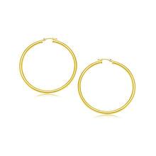 Load image into Gallery viewer, 10k Yellow Gold Polished Hoop Earrings (25 mm)
