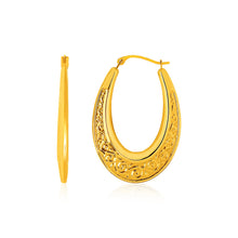 Load image into Gallery viewer, 14k Yellow Gold Graduated Oval Hoop Earrings with Swirl Design
