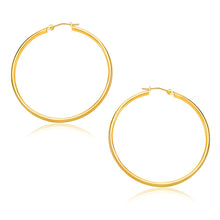 Load image into Gallery viewer, 10k Yellow Gold Polished Hoop Earrings (30mm)
